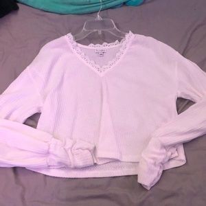 Thin material-white long sleeve, beautiful neckline and poofy sleeves